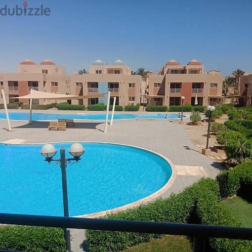 Side twin house for sale, fully finished, with a lagoon view in Makadi Heights, in installments  توين هاوس جانبي مكادي هايتس 7