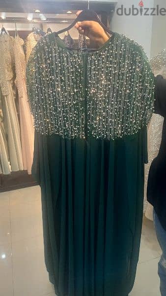 فستان سوارية خامات تركي تلبيس تحفة لون زيتي اخر قطعة 0