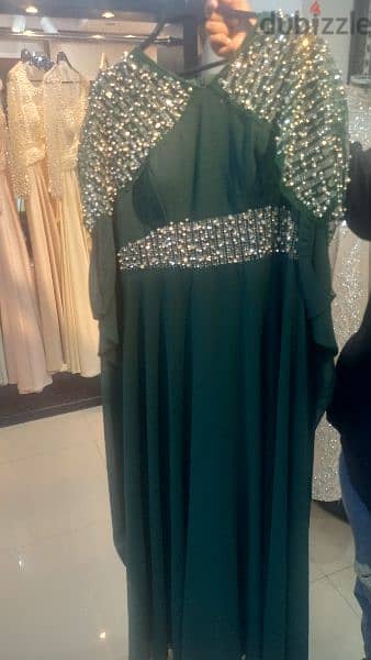فستان سوارية خامات تركي تلبيس تحفة لون زيتي اخر قطعة 1