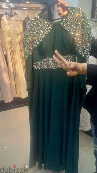 فستان سوارية خامات تركي تلبيس تحفة لون زيتي اخر قطعة 2