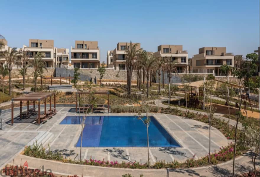 Own a two-bedroom apartment in Palm Hills New Cairo in convenient installments 1
