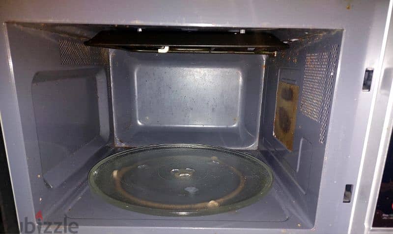 microwave  midea used in good condition  ميكروويف مايديا 2