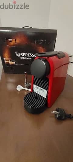 Nespresso Essenza Mini Red + Metal refillable capsule kit.