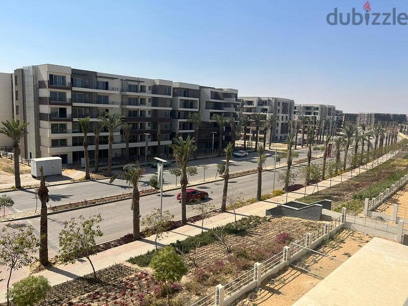 شقة لوكيشن متميز للغاية تطل علي اللاجون ومساحات خضراء واسعة للبيع في بالم هيلز القاهرة الجديدة 2