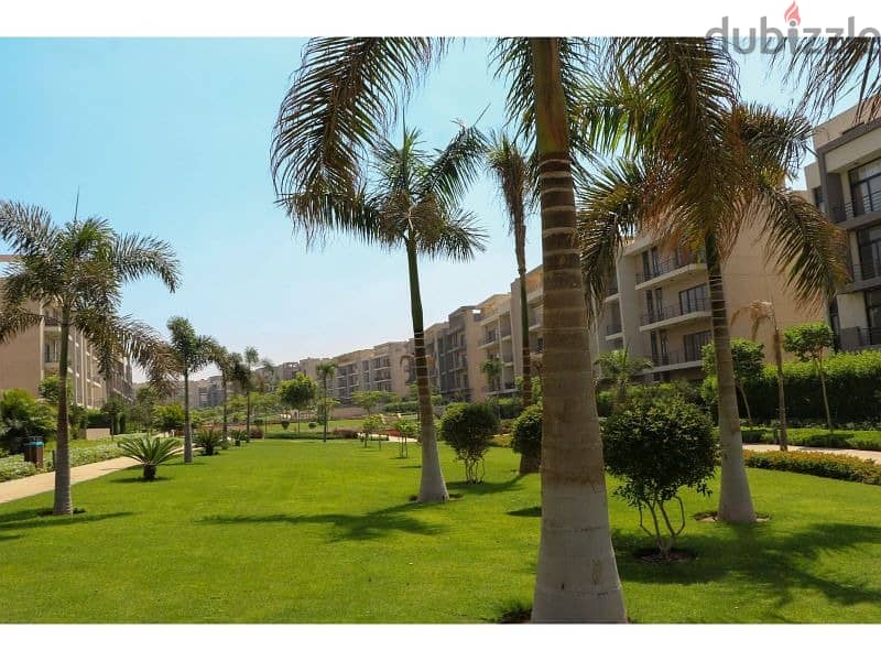 Apartment with garden for sale, 170 sqm, fully finished, delivary after one year view landscape in installments, in Fifth Square compound Al Marasem 2