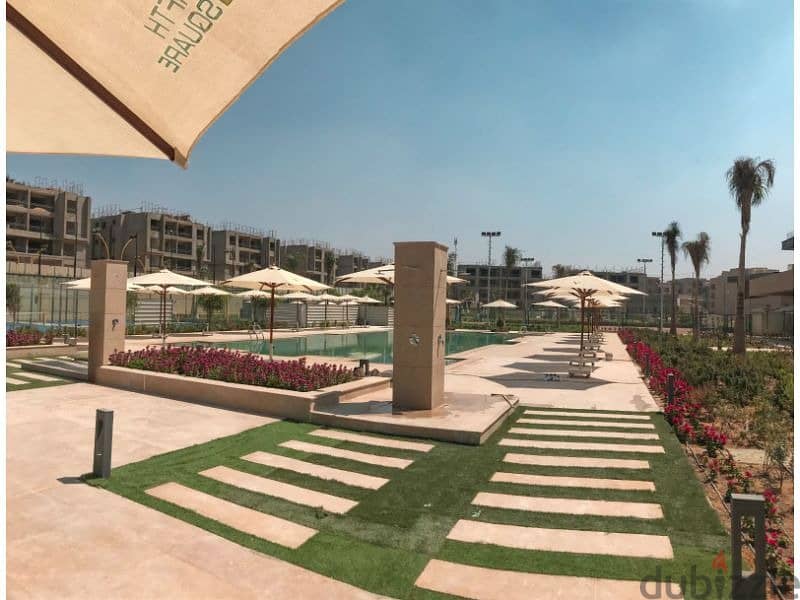 Apartment with garden for sale, 170 sqm, fully finished, delivary after one year view landscape in installments, in Fifth Square compound Al Marasem 5