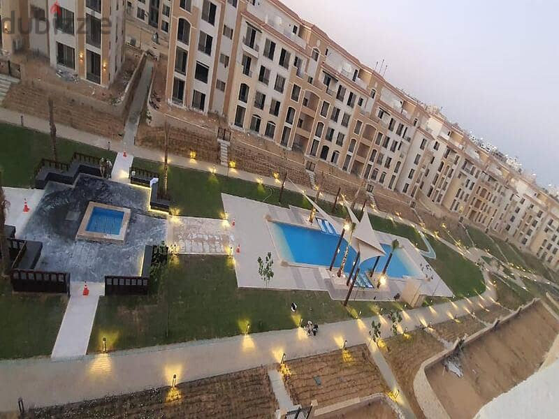 4-bedroom penthouse with roof area of ​​123 sq. m. , immediate receipt, with view and landscape in the heart of New Cairo - Stone Residence 11