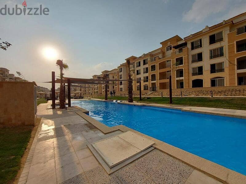 4-bedroom penthouse with roof area of ​​123 sq. m. , immediate receipt, with view and landscape in the heart of New Cairo - Stone Residence 13