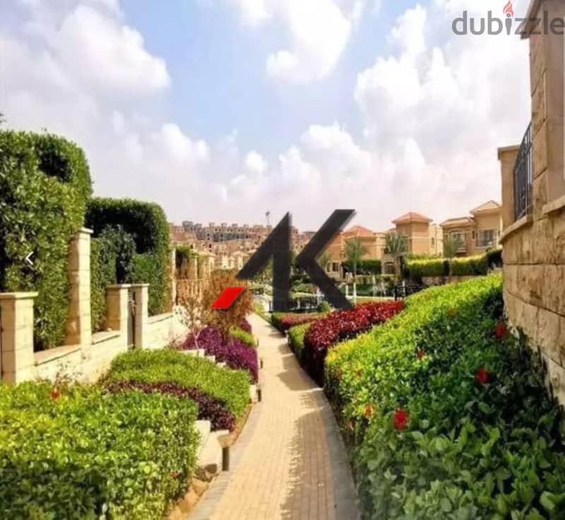Direct overlooking lagoon - installment Town Middle For Sale in Telal East - New Cairo 7