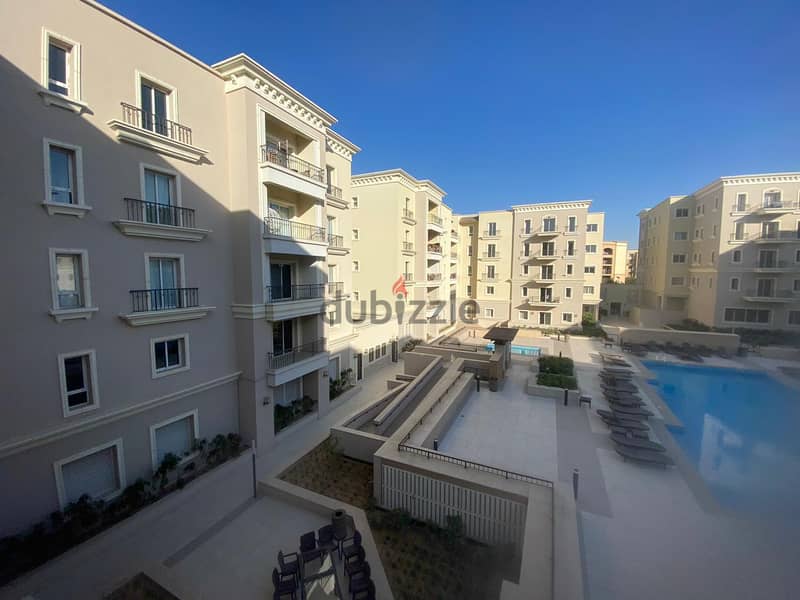 Apartment for sale in Mivida Compound in a prime location overlooking a prime location and swimming pool - شقة للبيع   في كمبوند ميفيدا بموقع مميز 7