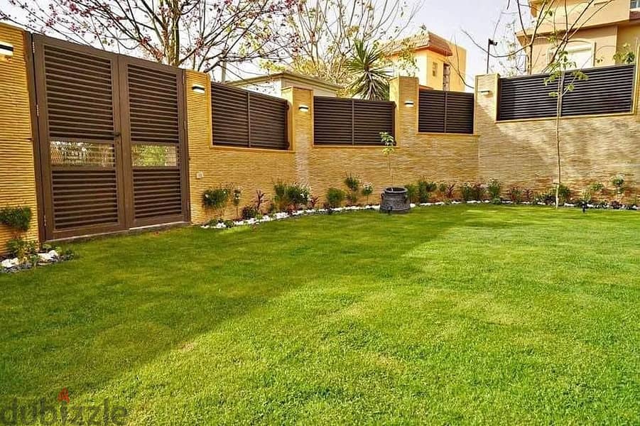 townhouse villa for sale with a 42% discount in Taj City Compound, a very special location on the Suez Road, 8-years installments 1