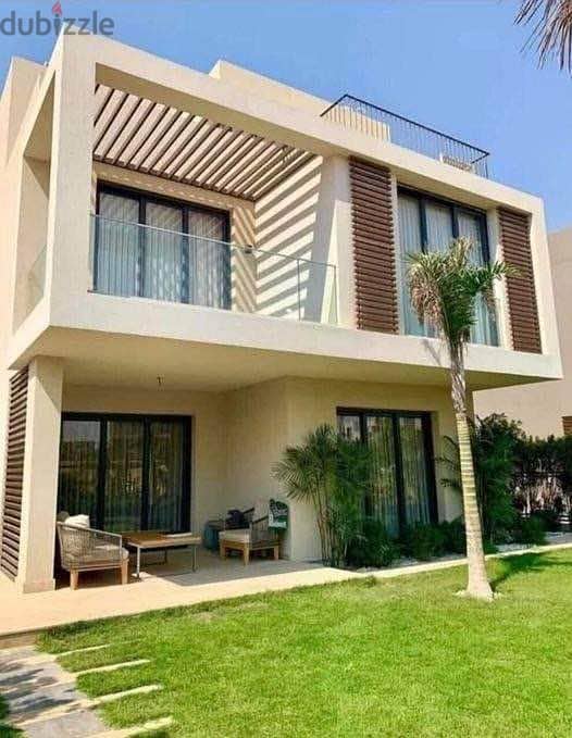 townhouse villa for sale with a 42% discount in Taj City Compound, a very special location on the Suez Road, 8-years installments 16