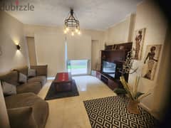 studio 90m with garden fully furnished for rent in village gate New Cairo