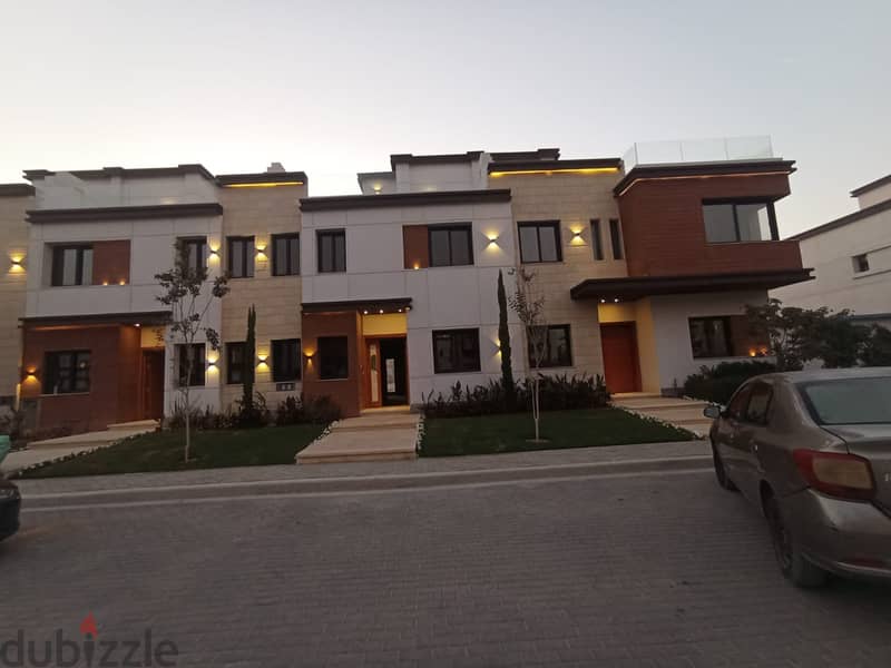 Town house for sale over looking the club house in Azzar 2 2