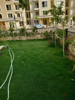 Next to Al Shorouk, an apartment with a garden for sale in Sarai Compound