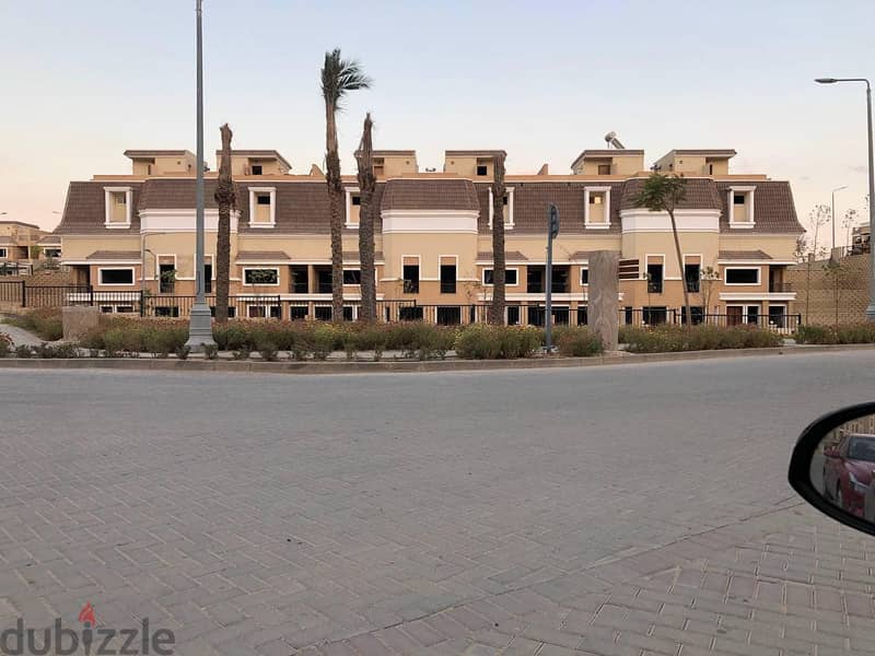Next to Al Shorouk, an apartment with a garden for sale in Sarai Compound 2