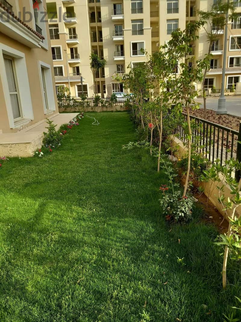 Next to Al Shorouk, an apartment with a garden for sale in Sarai Compound 3