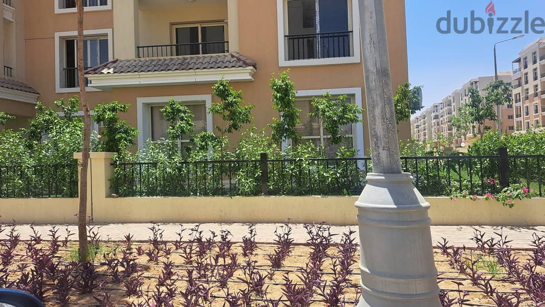Next to Al Shorouk, an apartment with a garden for sale in Sarai Compound 4