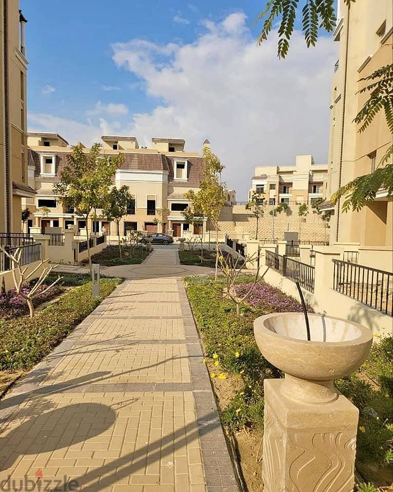 Next to Al Shorouk, an apartment with a garden for sale in Sarai Compound 5