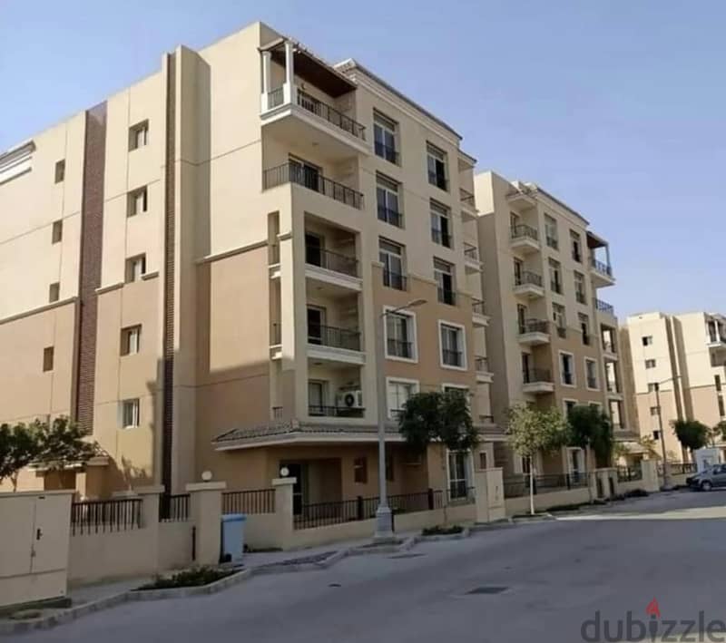 Next to Al Shorouk, an apartment with a garden for sale in Sarai Compound 6