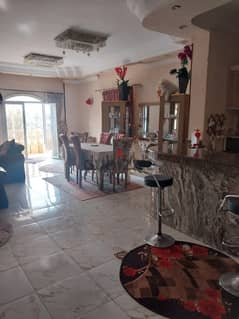 Furnished apartment for rent in Al-Banafseg Villas, near Mohamed Naguib axis and Al-Sadat axis  View Garden