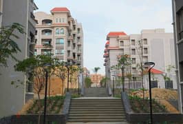 Apartment for sale in Garden Heights Compound, near the new Waterway, Mivida Compound, Hyde Park, Mountain View, and next to Izdir Compound on the sou