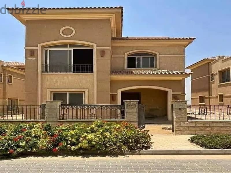 Townhouse villa for sale at a special price, in installments over 7 years, directly on Maadi Ring Road Stone Park 8