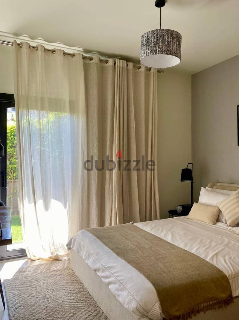 Duplex with garden for sale, immediate receipt and finished, in Al-Shorouk, directly in front of the International Medical Center | Al Burouj Compound 6