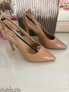 beige heels from dejavu and black heels from ordinary shoes shop 0