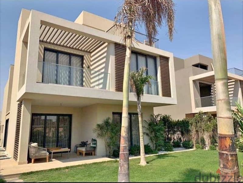 For sale, an independent villa in Taj City Compound, directly in front of the airport, direct on Suez Road, New Cairo. 1