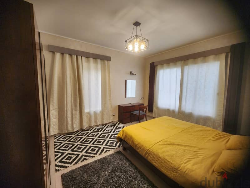 studio 90m with garden fully furnished for rent in village gate New Cairo 2