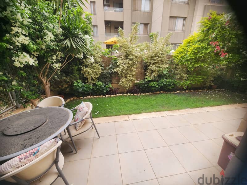 studio 90m with garden fully furnished for rent in village gate New Cairo 9