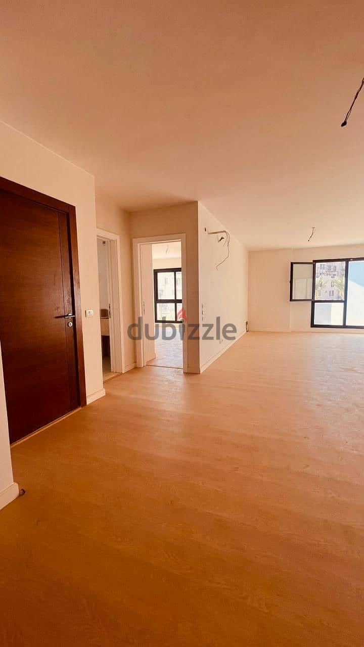 Apartment for sale at Owest compound شقة للبيع بكمبوند أويست متشطبة 14