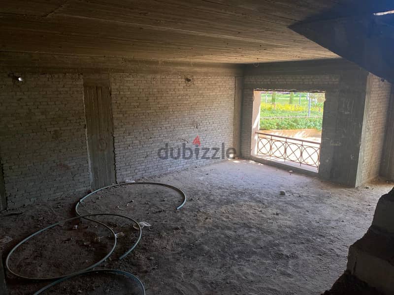 Villa for sale in Nour City (twin house) in installments for 10 years, 327 m 15