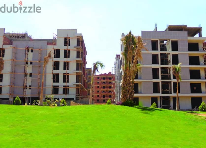 3-bedroom apartment for sale in front of Al-Rehab Gate in Creek Town Compound in an excellent location and landscape view with a 10% down payment 3