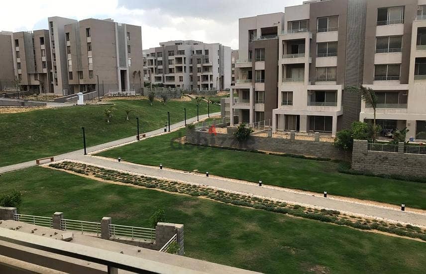 3-bedroom apartment for sale in front of Al-Rehab Gate in Creek Town Compound in an excellent location and landscape view with a 10% down payment 10