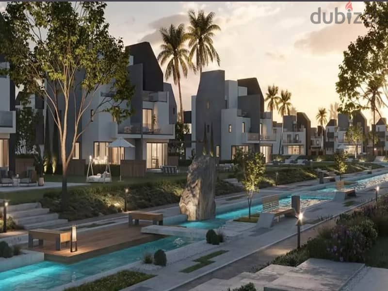 With only 5% down payment, own a duplex with a distinctive garden in the heart of Sheikh Zayed in Rivers Compound | Prime Location 2