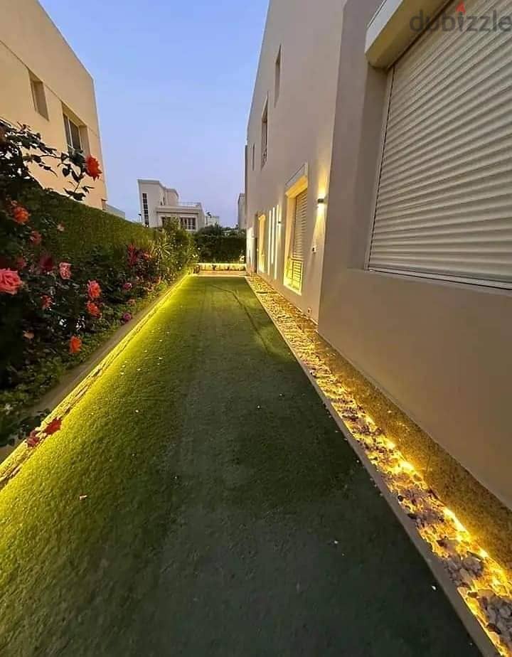 Apartment for sale with a private garden in front of Madinaty Villas, with a down payment of 1,100,000 2