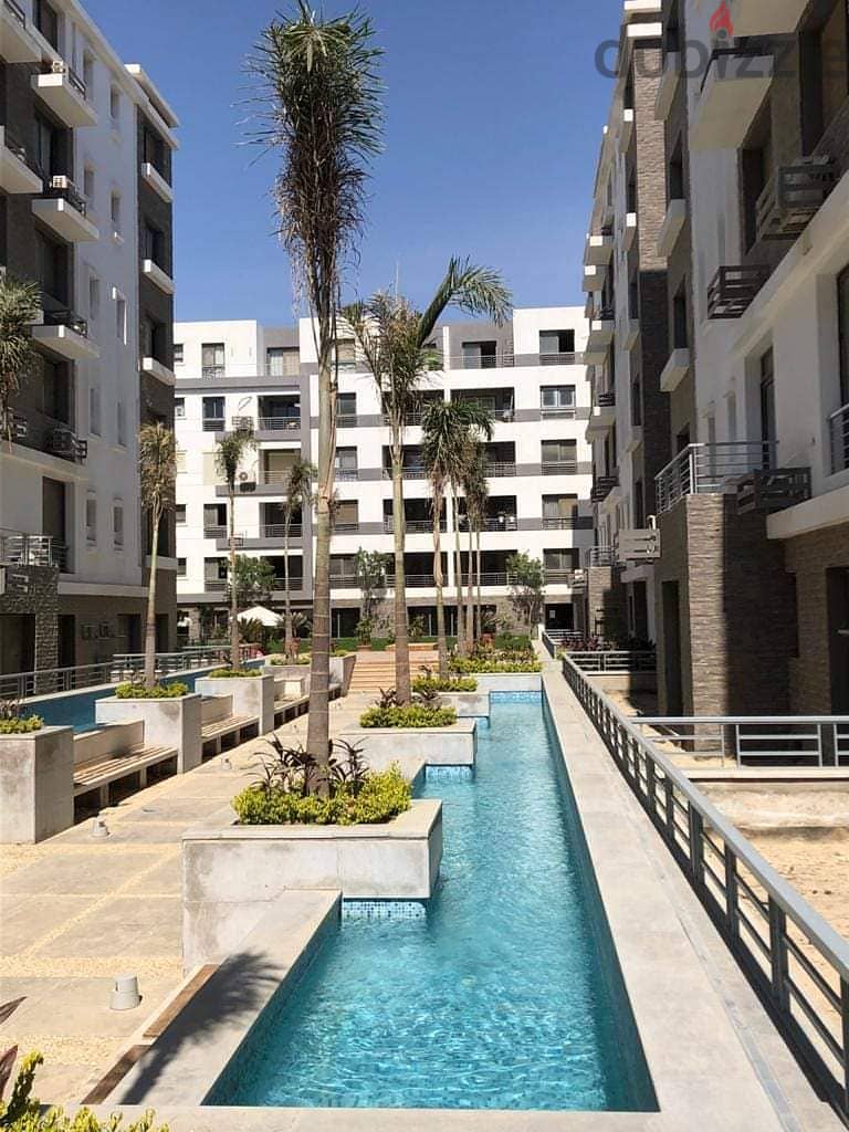 Apartment for sale in the Fifth Settlement, Taj City Compound, directly on the Suez Road, minutes from Heliopolis and Nasr City, in installments and t 14