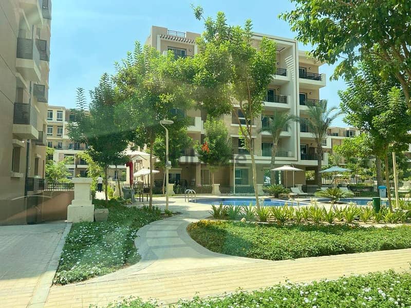 Apartment for sale in the Fifth Settlement, Taj City Compound, directly on the Suez Road, minutes from Heliopolis and Nasr City, in installments and t 24