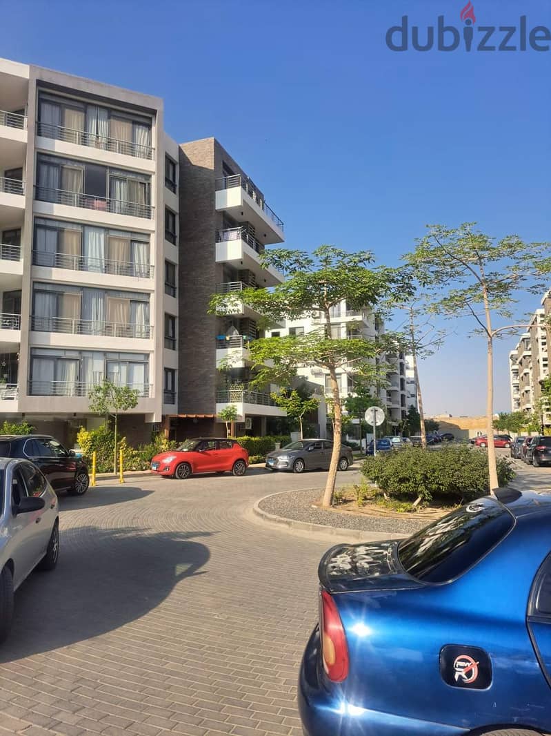 Apartment for sale in the Fifth Settlement, Taj City Compound, directly on the Suez Road, minutes from Heliopolis and Nasr City, in installments and t 27