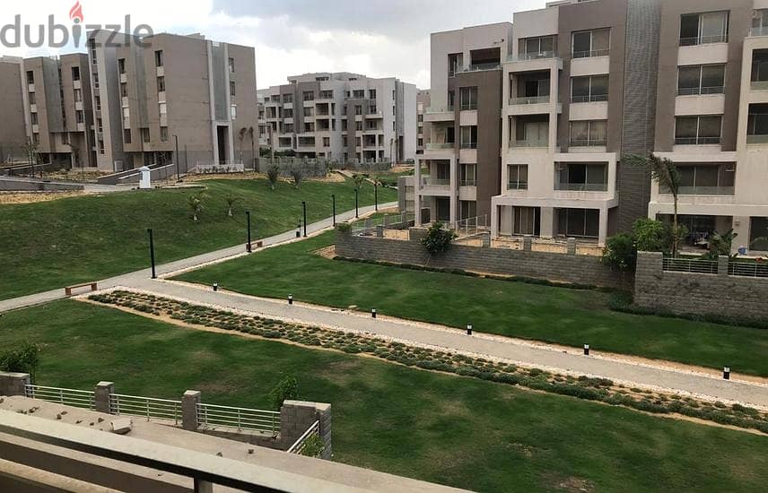 Ground floor apartment with garden for sale directly in front of Al-Rehab in Creek Town Compound in the First Settlement, Il Cazar Company 10