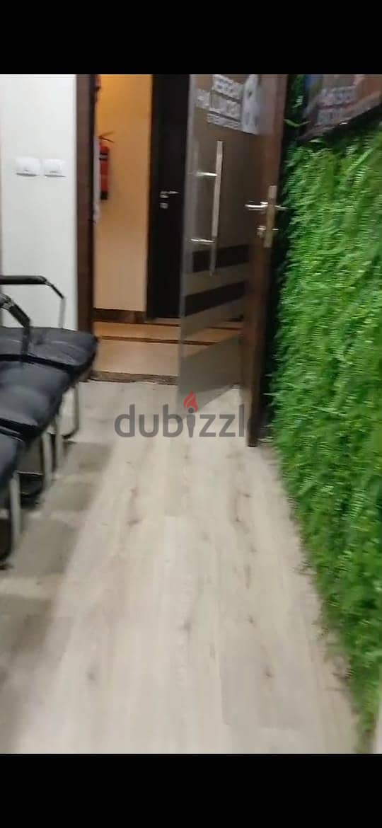 lowest price office 2rooms with parking for rent in Trivium square New Cairo 6