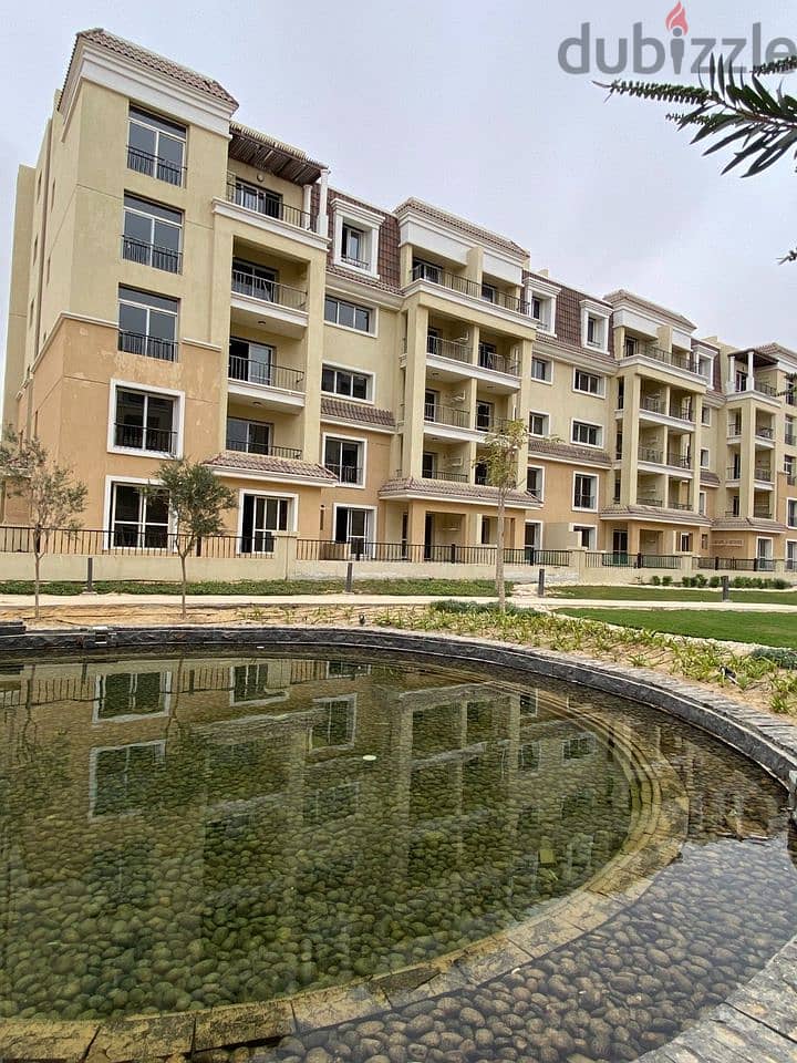 A luxury apartment for sale at a 42% discount, with the best division and a distinctive view, inside Sarai Compound, minutes away from the Fi 7
