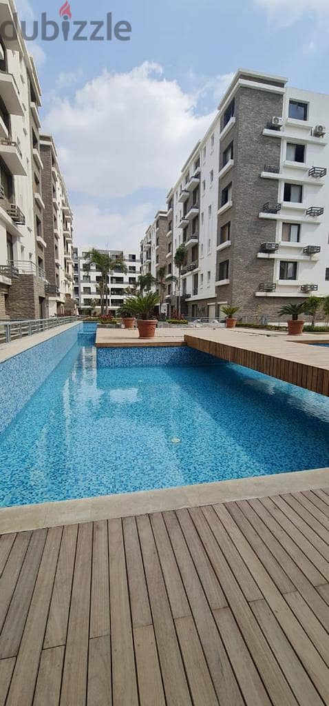 Apartment for sale, prime location, in the Settlement, inside the Taj City Compound, next to Madinaty,at a snapshot price and installments up to 8year 2