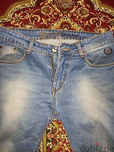 بنطلون جينز خامة ليكرا تقيل صناعة الهند مقاس 32 1