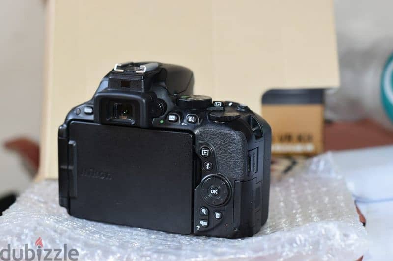 Nikon D5500 camera with godox ringflash 5
