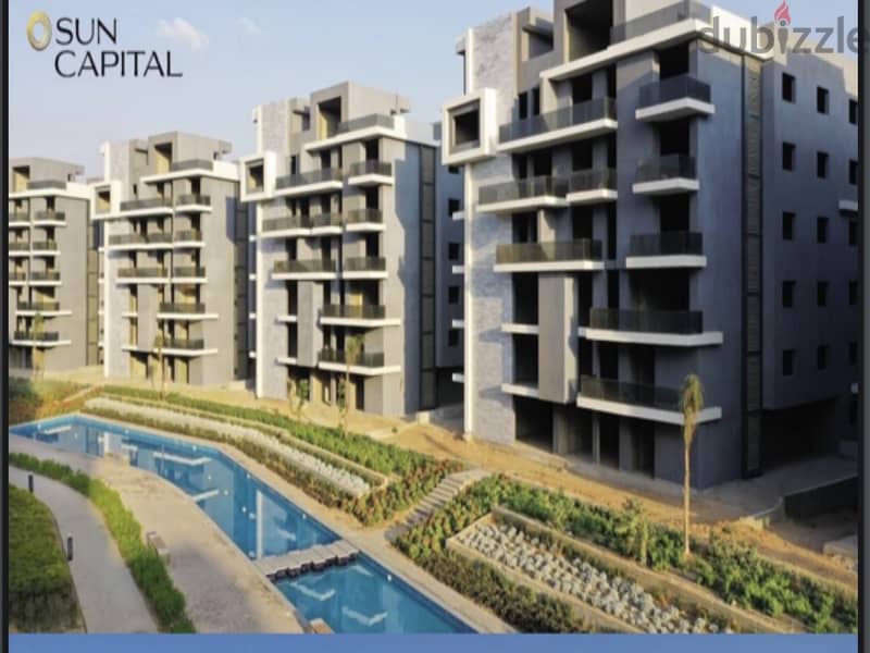 Ground apartment with a private garden, immediate receipt, in Sun Capital, the heart of October, with a 10% down payment and equal installments 13