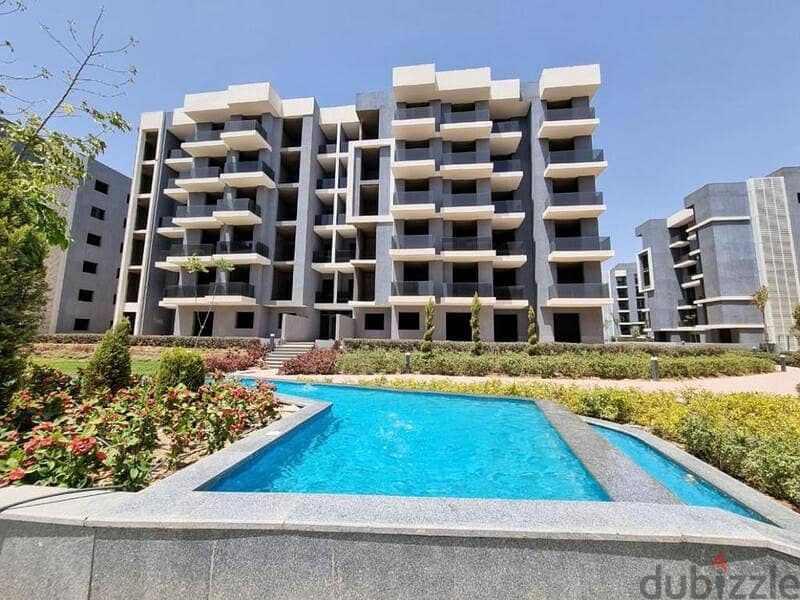 Ground apartment with a private garden, immediate receipt, in Sun Capital, the heart of October, with a 10% down payment and equal installments 19