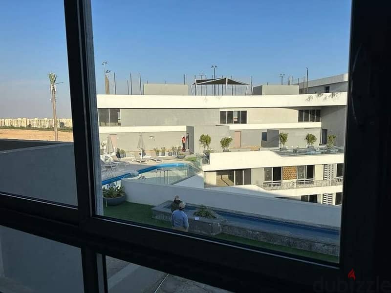 Apartment for sale 130m+garden wonderful view on lagoon in the most prestigious Bloomfields compound in Mostaqbal City, New Cairo 10% Discount 20